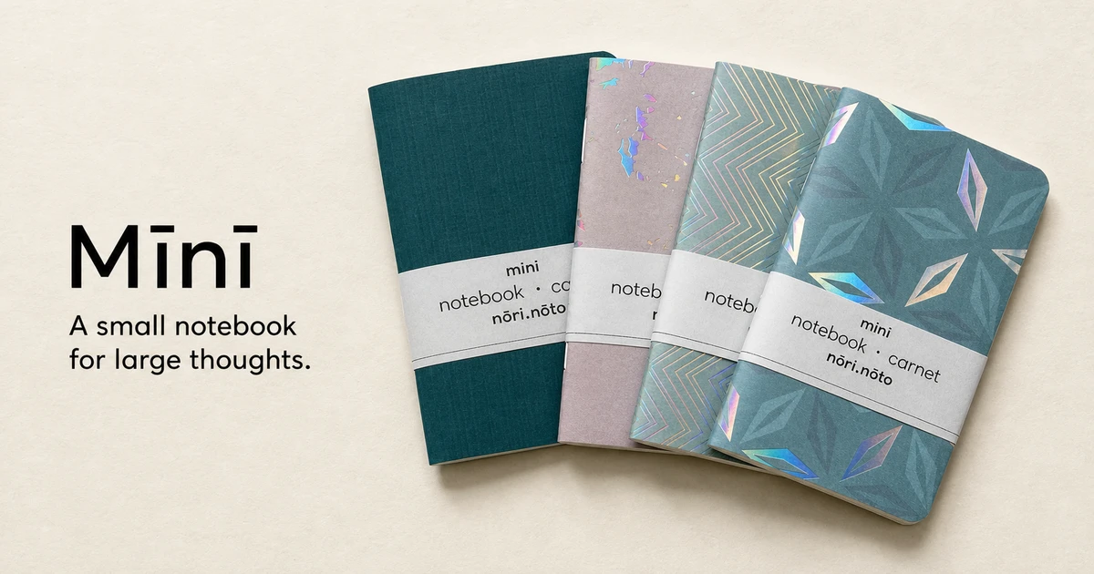 Four Mīnī notebooks with varied creative-paper covers